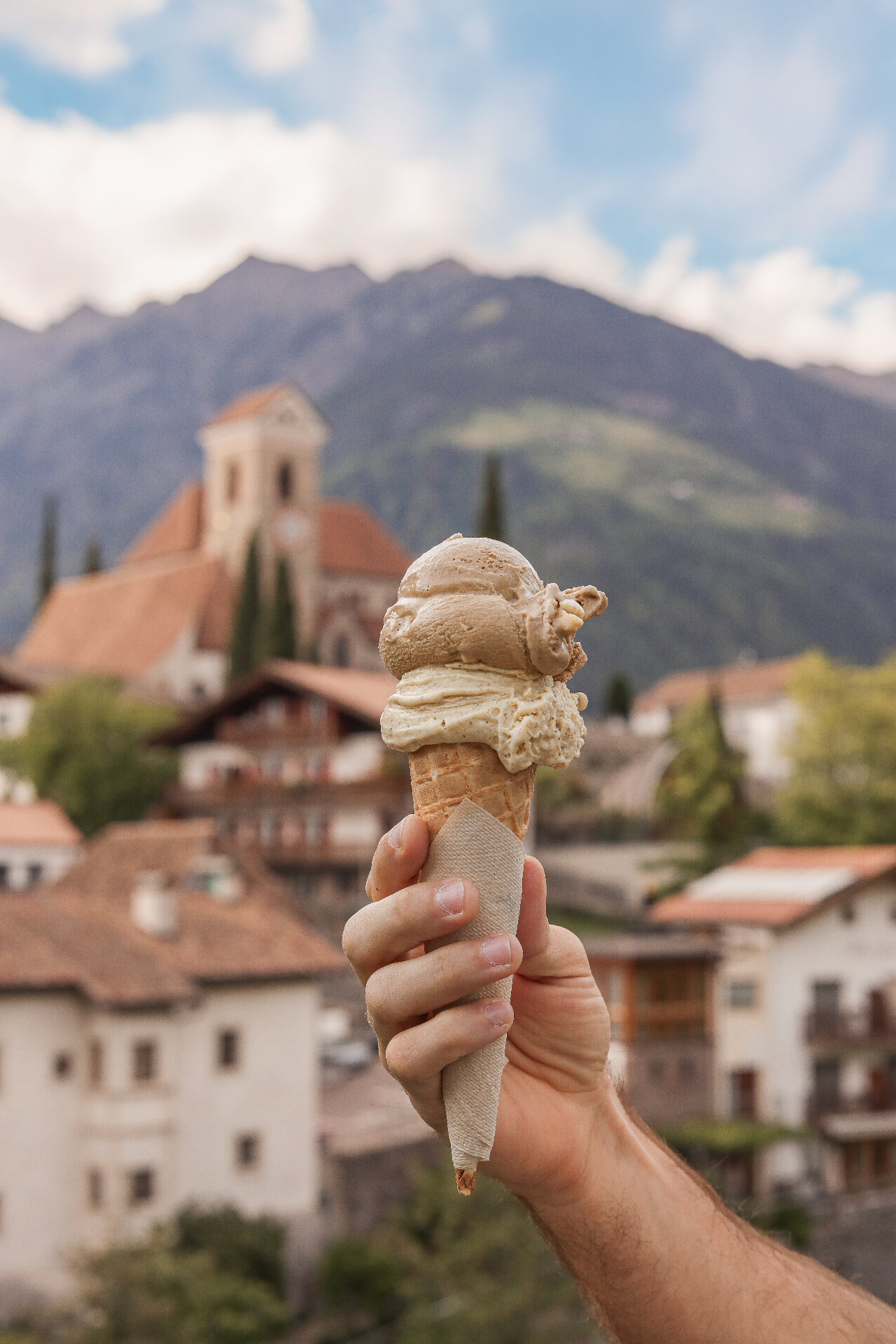 Waffle cone casting a shadow on a minimal wall
